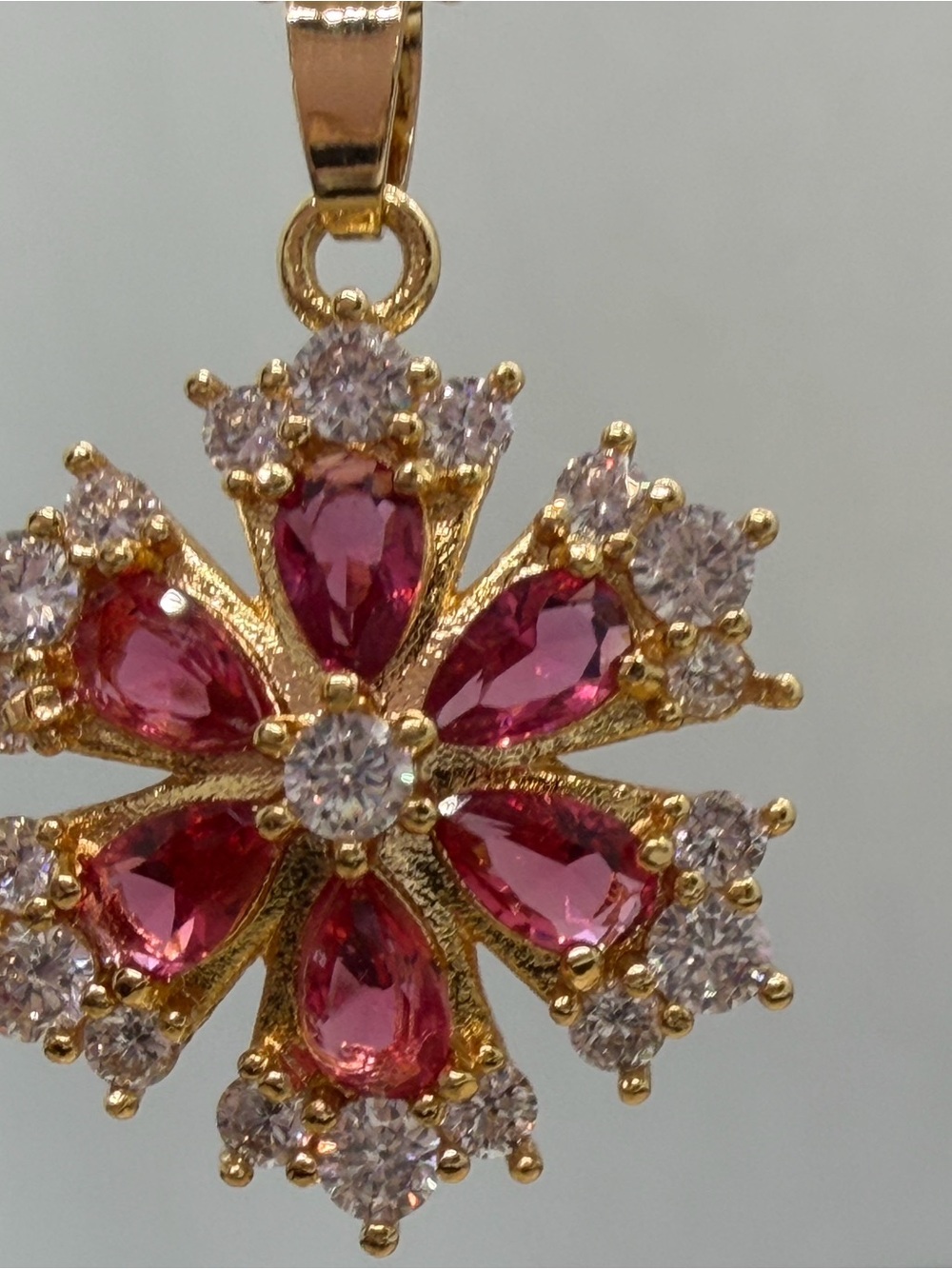 Gold Floral Pendant Necklace with Pink Teardrop Stones
